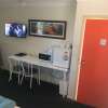 Отель Across Country Motel and Serviced Apartments, фото 3