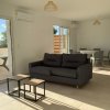 Отель Résidence Marina di Bravone - appartement 6 personnes Vue Mer 1er étage N93-94, фото 2