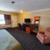 Отель Delmonico Inn & Suites, фото 1