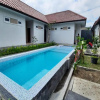 Отель OYO 3906 Dalem Putu Sanjaya Syariah, фото 6