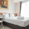 Отель Comfortable and Minimalist Studio Apartment at Woodland Park Residence, фото 2