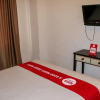 Отель Nida Rooms Lubis 3 Medan Baru at Hotel Rumah Anaya, фото 3