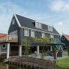Отель Holiday Home Built in Zaanse Style, Near Alkmaar, фото 14