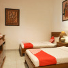 Отель OYO 244 Griya Cemara Homestay, фото 12