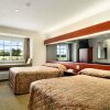 Отель Microtel Inn & Suites by Wyndham Tunica Resorts в Робинсонвиле