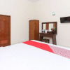 Отель OYO 1680 Dahlia Guesthouse, фото 2