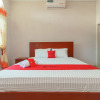 Отель Reddoorz Syariah Near Uisu Medan, фото 18