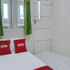Отель OYO Life 92684 Kost Mutiara Nirwana, фото 2