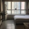 Отель Chongqing Yaju Apartment, фото 8