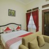 Отель OYO 804 Ndalem Maharani Guest House, фото 3