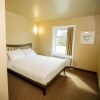 Отель Refresh Inn & Suites, фото 4