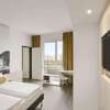 Отель Super 8 by Wyndham Munich City West, фото 3