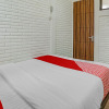Отель OYO 90828 Ara Guest House, фото 8