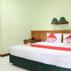 Отель OYO 154 Griya Patria Guest House, фото 3