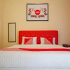 Отель OYO 2202 Delima Guest House Syariah, фото 17
