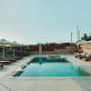 Отель Aqua-tastic Getaway Marathopoli s Poolside Gem, фото 15