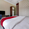 Отель OYO 90564 Hotel Merangin Syariah, фото 6