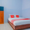 Отель OYO 1976 Omah Kost Family, фото 4