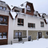 Отель Sky Cabin Apartments, фото 1