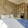 Отель Homey And Clean Studio At Sky House Alam Sutera Apartment, фото 9
