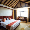 Отель Maitreya Sanlong Hotel (Huquan Hot Spring Ecological Park Honghe Water Town Branch), фото 4