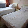 Отель Dalian Xingyue Inn, фото 1