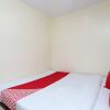 Отель OYO 24653 Novus Guest House, фото 11