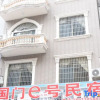 Отель Dongxing Guomen e Homestay, фото 4