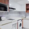 Отель Comfort Living And Homey 1Br Tamansari Bintaro Mansion Apartment, фото 5