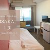 Отель EX Shirokitakoen Apartment 606 в Осаке