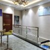 Отель Fenggang Future City Apartment, фото 3