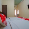 Отель Triantama Kost Syariah by OYO Rooms, фото 7