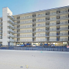 Отель Oceanfront Crescent Sands Beach W/ Pool 3 Bedroom Condo, фото 1