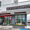 Отель Wesley Hotel в Буките-Мертаджаме