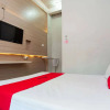 Отель RedDoorz @ KM 5 Palembang, фото 6