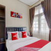 Отель OYO 90175 Tl Guest House, фото 6