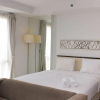 Отель Comfortable And Spacious Studio At Azalea Suites Apartment, фото 15