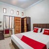 Отель OYO 90751 Graha Sei Batugingging, фото 7