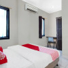 Отель Guest House 19 Syariah By OYO, фото 13