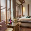 Отель Yunzhong Baisha Lijiang Inn, фото 30
