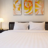 Отель Comfy 2BR L'Avenue Apartment, фото 14