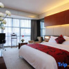 Отель Dalian Tianxin Holiday Hotel Apartment (Dalian Hi-tech Wanda Branch), фото 5