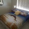 Отель Ocean Beach Chalet 16, фото 4