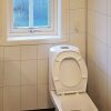 Отель 10 Person Holiday Home in Urangsvåg, фото 12