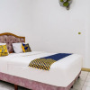 Отель OYO 91546 Dewi Sudirman Homestay, фото 4