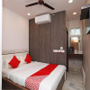 Отель OYO Flagship 28085 99 Kombo Stay, фото 3
