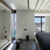 Отель CUBIC Mykonos Seafront Design Suites, фото 9
