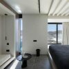 Отель CUBIC Mykonos Seafront Design Suites, фото 10