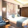Отель XiShuang Banna Yue Ying Fu Xing Hotel, фото 3