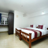 Отель OYO 11685 Mangosteen Holidays, фото 4
